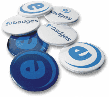Several made up circular pin badges with e-badges logo